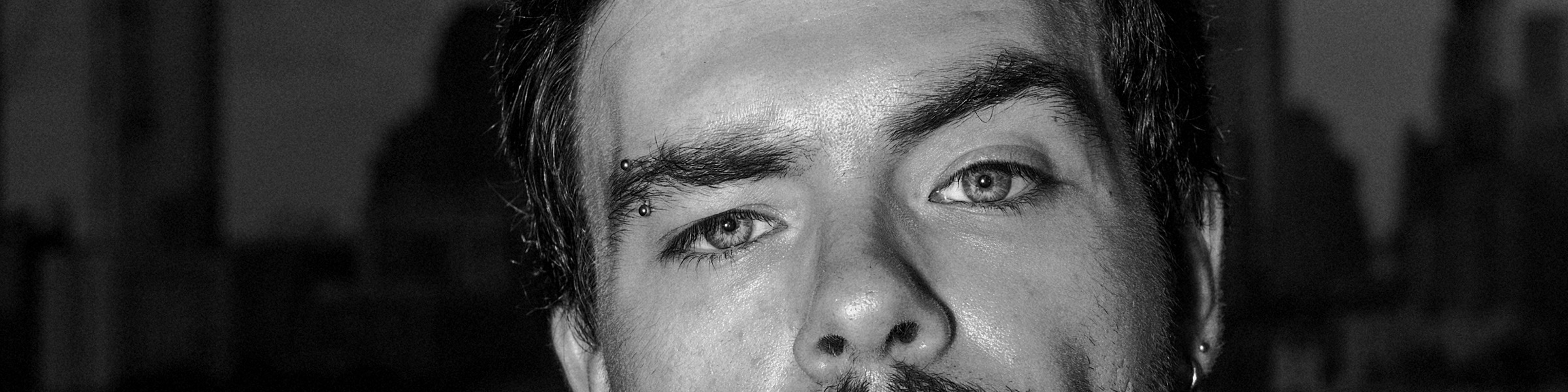 Black and white portrait crop for KARABURMA